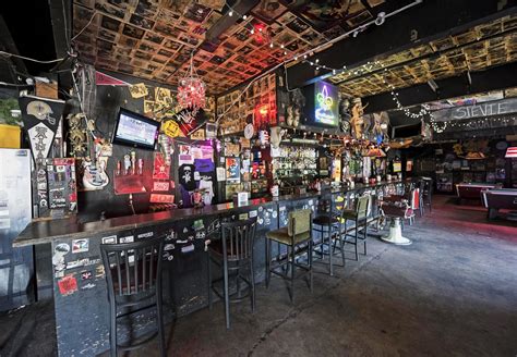You know the type, where the atmosphere is hot and the beer is ice . . Dive bars near me